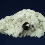 Spessartine garnet on Microcline