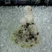 Dolomite and Chalcopyrite on Calcite