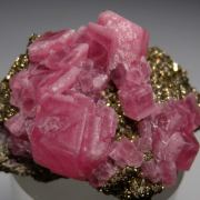 Rhodochrosite on Pyrite