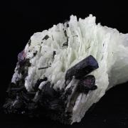 Cleavelandite + Tourmaline + Lepidolite.