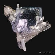 Fluorite included with Bismuthinite on Quartz