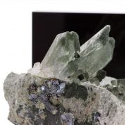 Quartz Chlorite + Hematite.