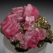 Rhodochrosite on Pyrite