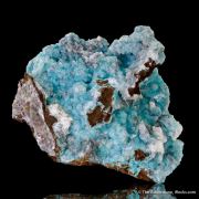 Aurichalcite included in Calcite