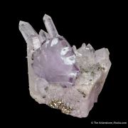 Fluorite (twinned) on Quartz