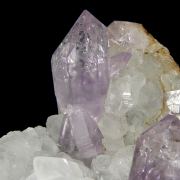 Amethyst (“reverse” scepters) on Calcite