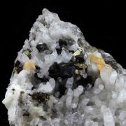 Siderite, Quartz, Pyrite, Chalcopyrite.