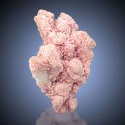 Rhodochrosite  on Quartz