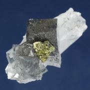 Fluorite (Jamesonite inclusions) with Chalcopyrite on Quartz