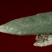 Quartz (var. Prase) on Calcite