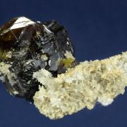 Sphalerite ( var. Cleophane ) on Quartz