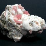 Rhodochrosite on Quartz