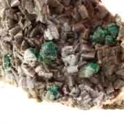 Ankerite + Chalcopyrite + Malachite.