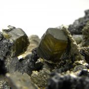 Siderite on Pyrite (replacing Siderite) with Stannite