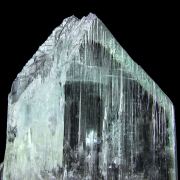 Spodumene /(var: “Kunzite”)(doubly-terminated,“floater” bi-color twinned crystal)