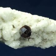 Spessartine garnet on Microcline