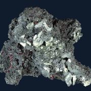 Proustite on Polybasite(?)