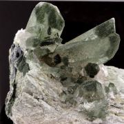 Quartz Chlorite + Hematite.