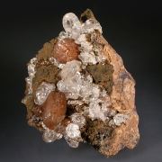 Olmiite with Calcite on Goethite