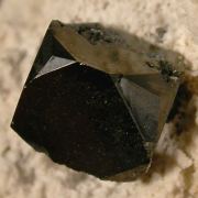 Bixbyite with Topaz and Pseudobrookite