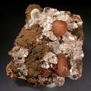 Olmiite with Calcite on Goethite