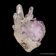 Fluorite (twinned) on Quartz