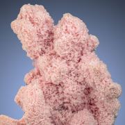 Rhodochrosite  on Quartz