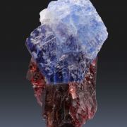 Sapphire on Spessartine Garnet