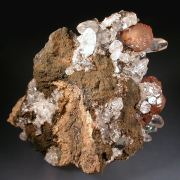 Olmiite with Calcite on Goethite