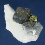 Fluorite (Jamesonite inclusions) with Chalcopyrite on Quartz