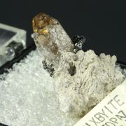 Bixbyite on Topaz