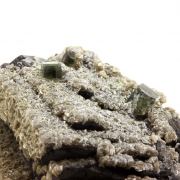 Ferberite, Siderite, Fluorapatite.