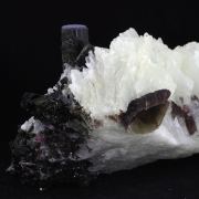 Cleavelandite + Tourmaline + Lepidolite.