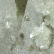 Zunyite on Quartz