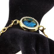 Raw neon blue Apatite strap Medallion 25mm model.