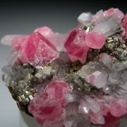 Rhodochrosite, Quartz on Pyrite