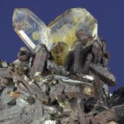 Quartz ( Japan-law twin ) with Siderite pseudomorphs