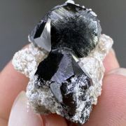 Bixbyite-(Mn), topaz