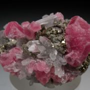 Rhodochrosite, Quartz on Pyrite