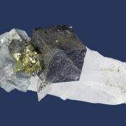 Fluorite (Jamesonite inclusions) with Chalcopyrite on Quartz