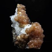 Olmiite + Calcite.