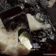 Tantalite-(Fe) with Cassiterite, Albite and Muscovite