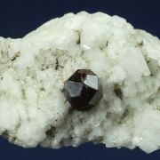 Spessartine garnet on Microcline