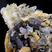 Siderite, Quartz, Bournonite, Pyrite.