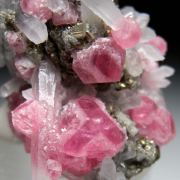 Rhodochrosite, Quartz on Pyrite