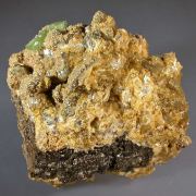 Ludlamite on Siderite and Pyrite