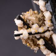 Zircon crystals on/after Siderite with Orthoclase, Quartz, and Aegirine