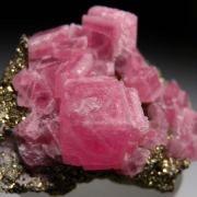 Rhodochrosite on Pyrite