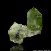 Forsterite var. Peridot with Magnetite