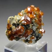 gem GARNET var. SPESSARTINE, MUSCOVITE